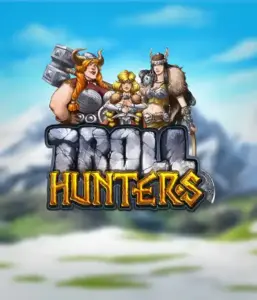 Изображение слота "Troll Hunters" от Play'N Go, где изображены три викинга: две женщины и один мужчина, одетые в традиционные викингские доспехи. На фоне виднеются горные вершины, что добавляет атмосферу северных легенд. Этот игровой автомат идеален для любителей скандинавской культуры и эпических приключений.